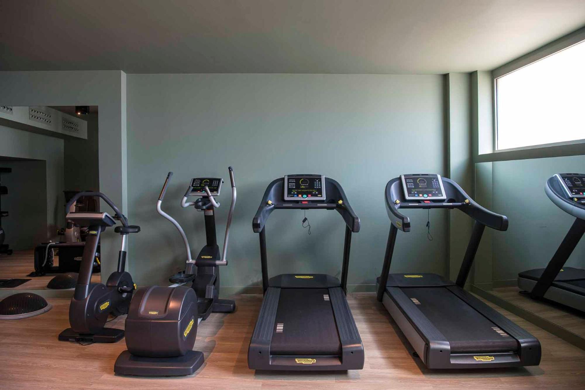 Columbus Urban Resort فلورنس المظهر الخارجي الصورة Elliptical trainer, treadmill and stationary bicycle